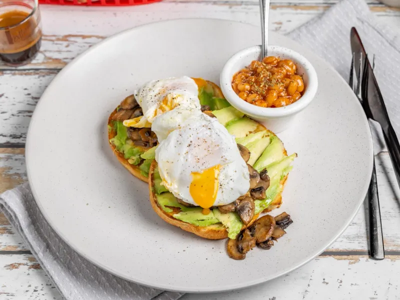 Poached eggs on avo with mushrooms and a side of relish