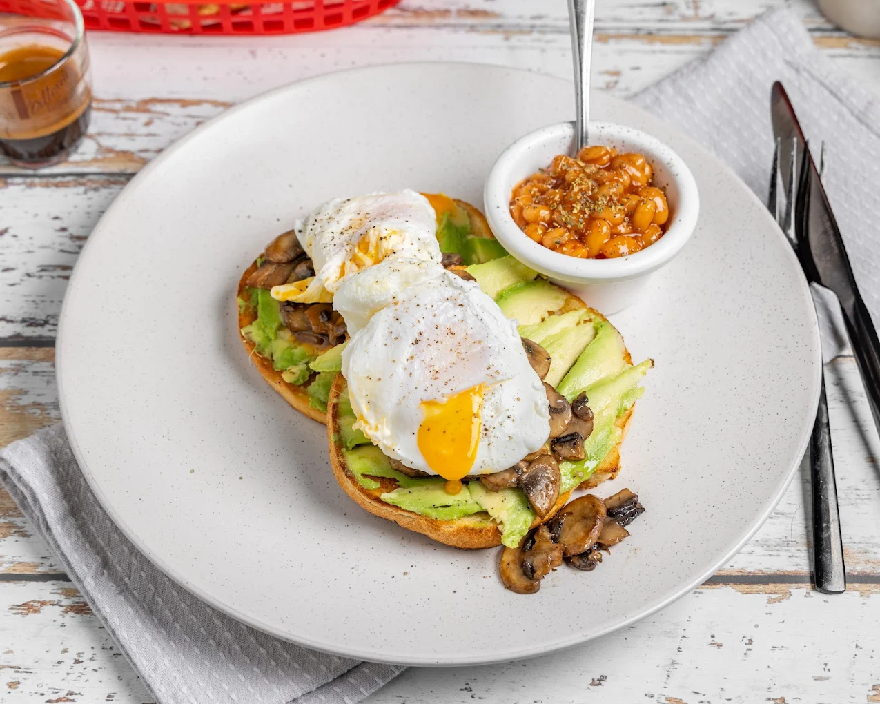 Poached eggs on avo with mushrooms and a side of relish